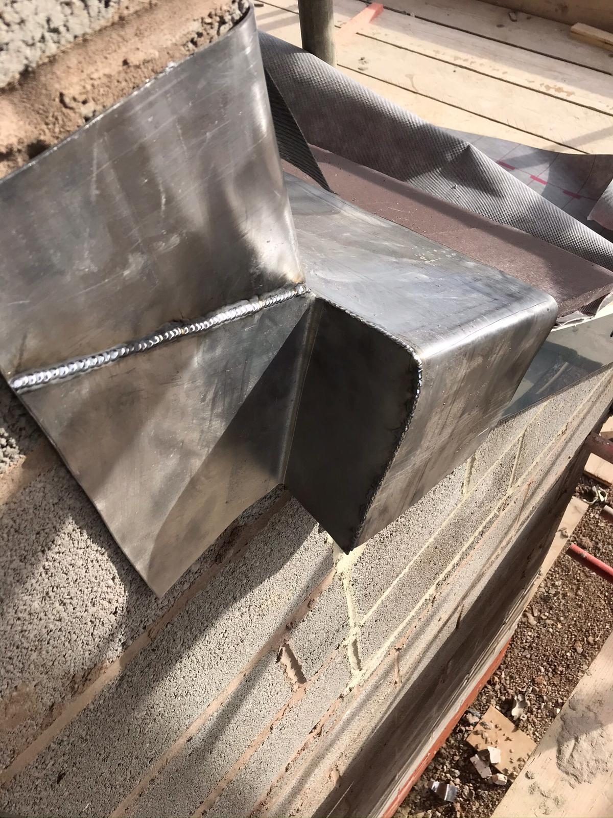 Completed - The completed bespoke lead flashing detail with neatly welded joints