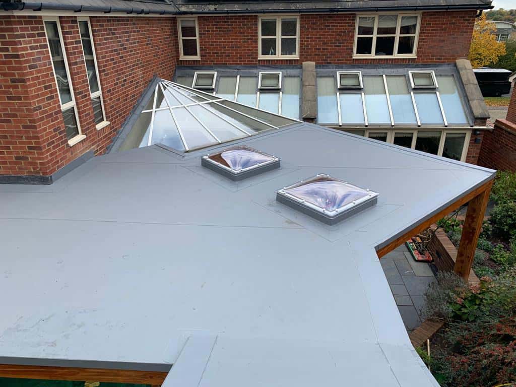 Complex modern flat roof with skylights